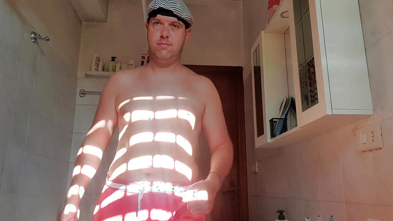 Nude boy in bathroom