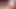 セクシーなレズボが前かがみになり、ピアスのある秘部を舐められ指で指を使われる