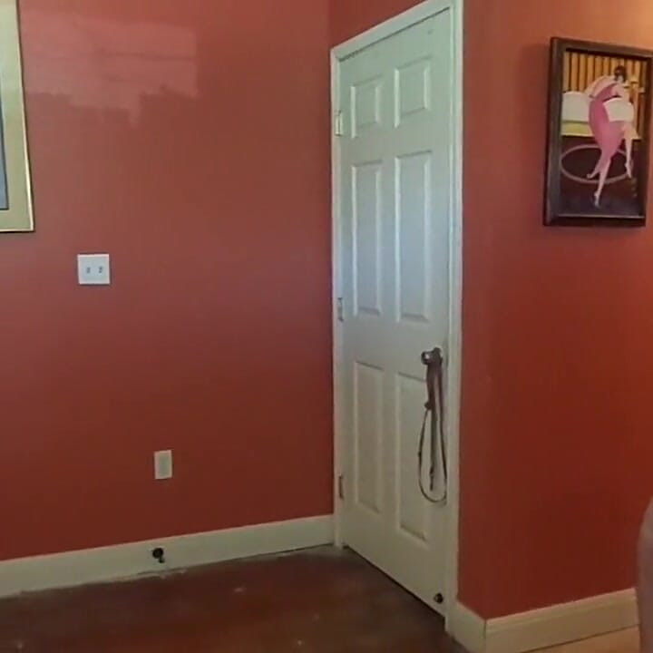 Crossdresser helps put on a corset for BBW
