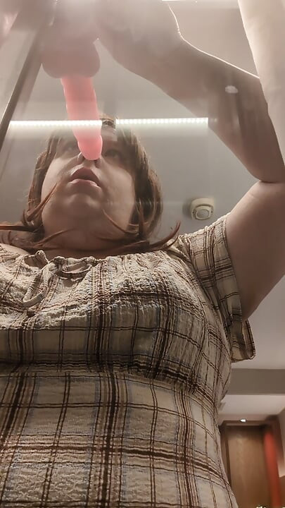 Kelli completes her Deep throat training at an open window