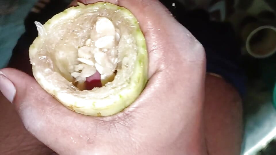 An Indian boy made a hole in a cucumber and inserted his penis inside it and masturbated.