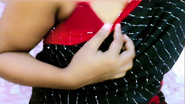 A shy but cute desi girl looks absolutely stunning in her traditional saree, showing off her natural beauty with a teasing and p