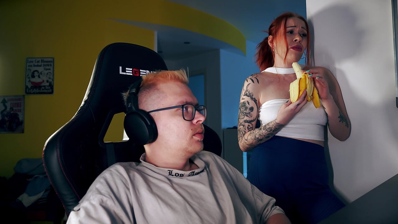 Stepmom Seduces Stepson Under Desk for Facial While He Games