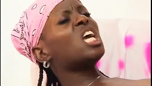 A pretty ebony small-titted babe stands astride and gets dick inside