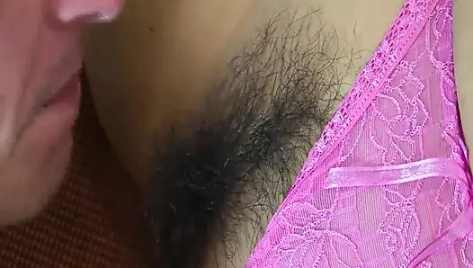 Tattooed man pounds a busty Asian babe with hairy pussy on the sofa
