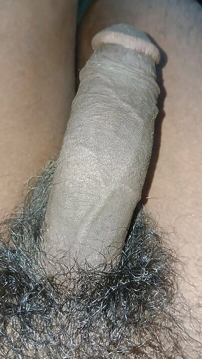 The village boy is having fun in the field with a big cock the darkest cook in Indian.