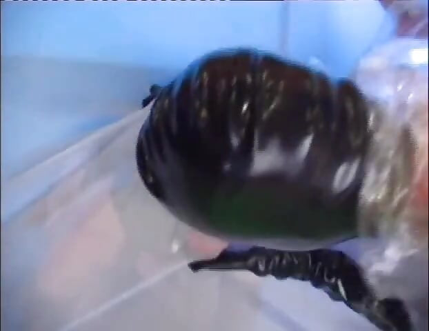 Latex masked chick anally fucked from her naughty fucker