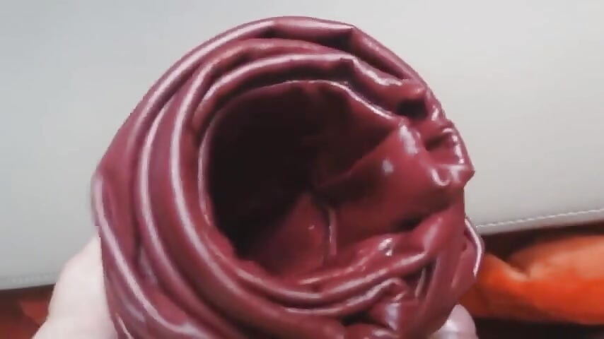 Cumming into leather fleshlight