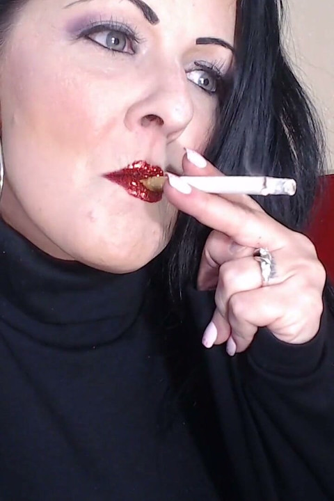 Closeup smoking red glittered lipstick