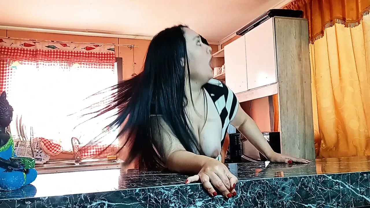 My young stepmom is so hot that I fucked her in the kitchen.