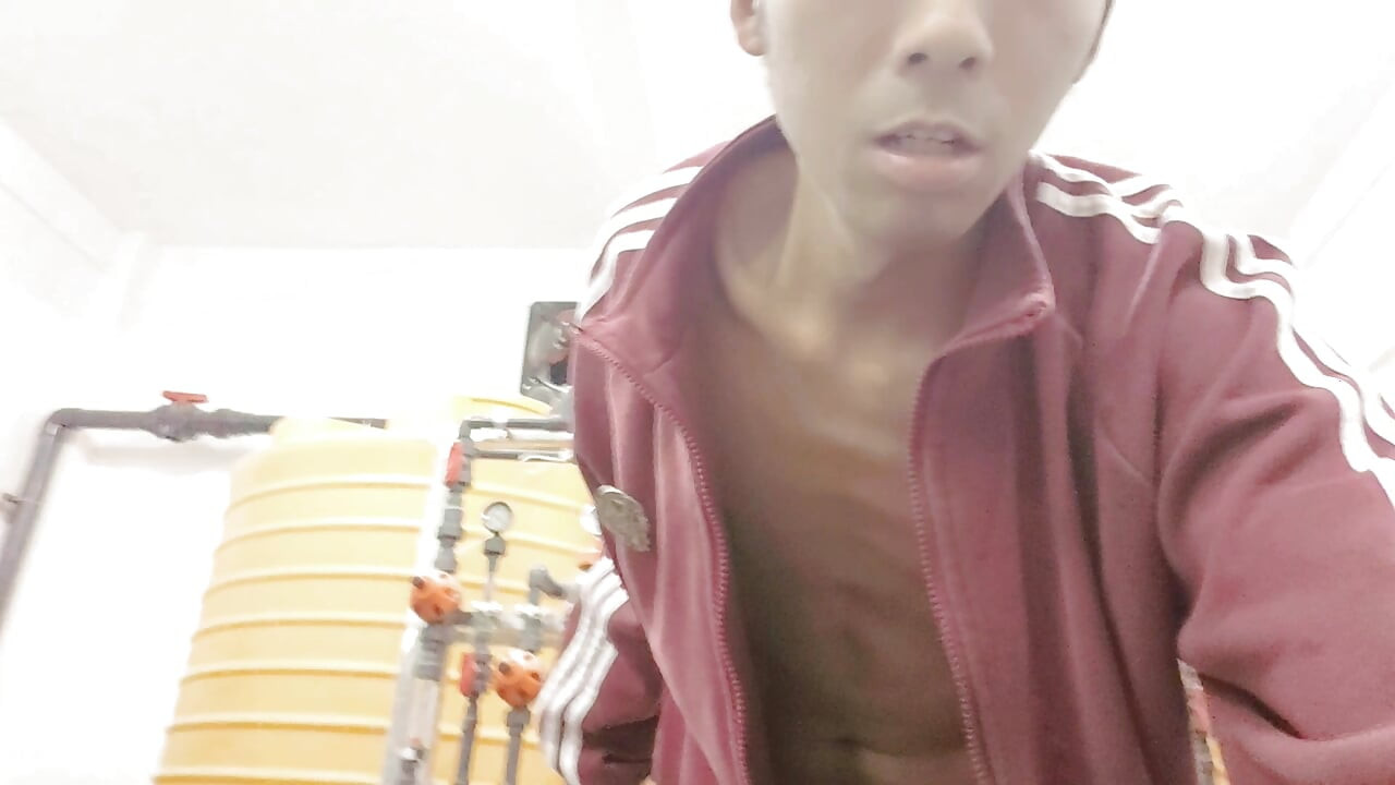 A mischievous Asian boy masturbates, moaning, ejaculating, and consuming semen in a factory laboratory
