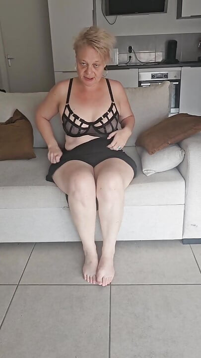 Mature and Sexy Stepmom Plays with Her Wet Pussy