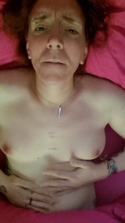 Trans playing in bed solo