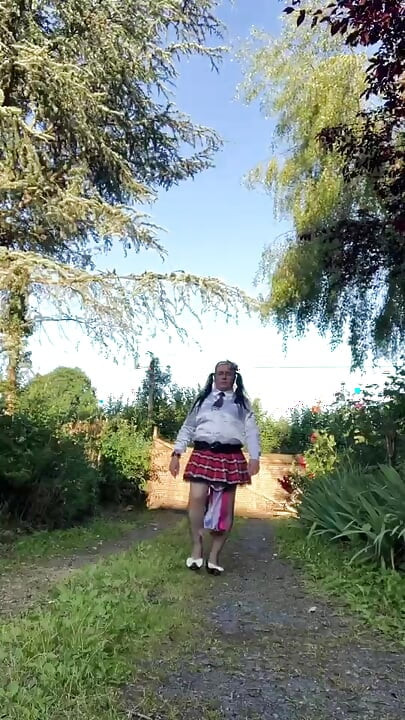 In schoolgirl outfit for an evening