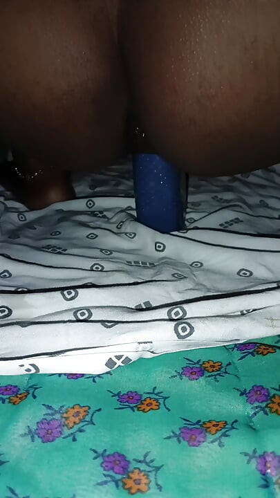 Inserting the bottle deep into the
