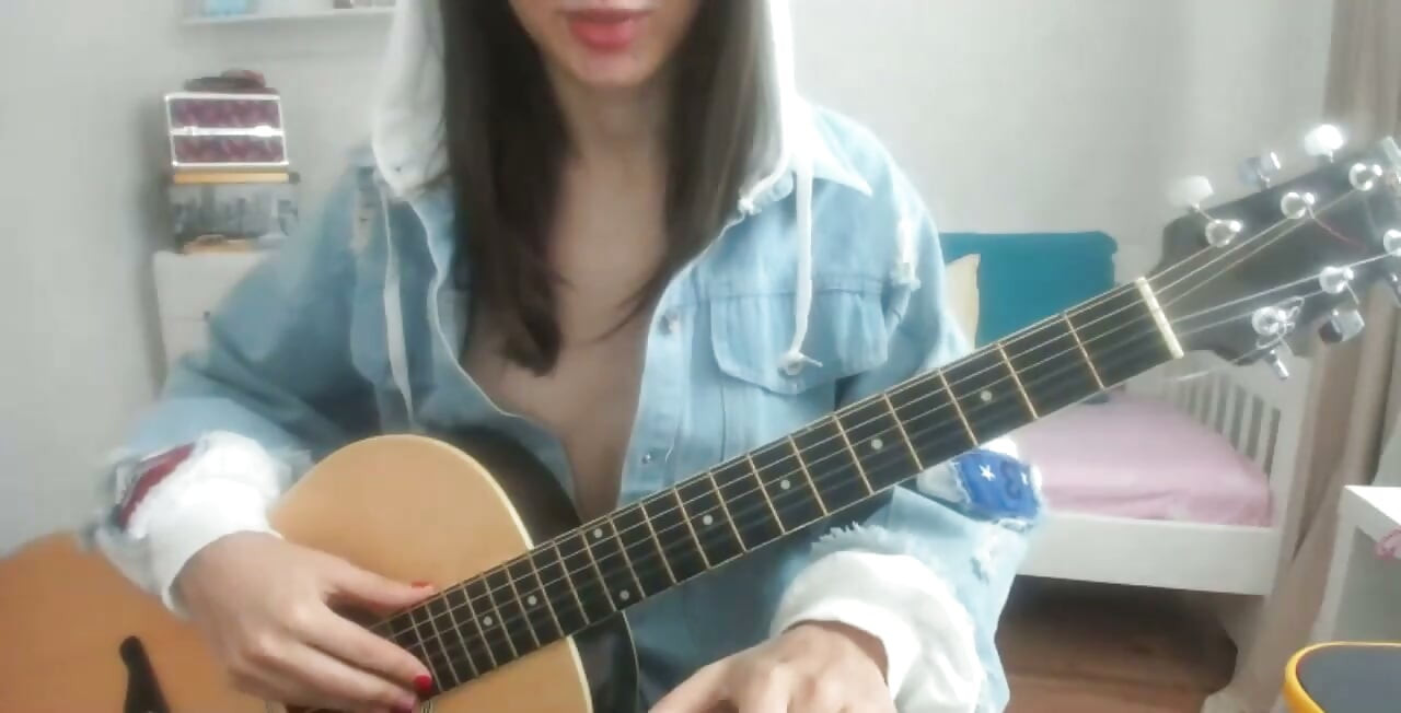 Webcam Asian Hottie in Jeans Showing Big Nipples