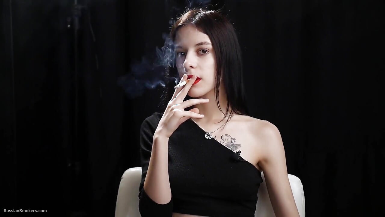 Slim Chick Is Smoking Two Reds