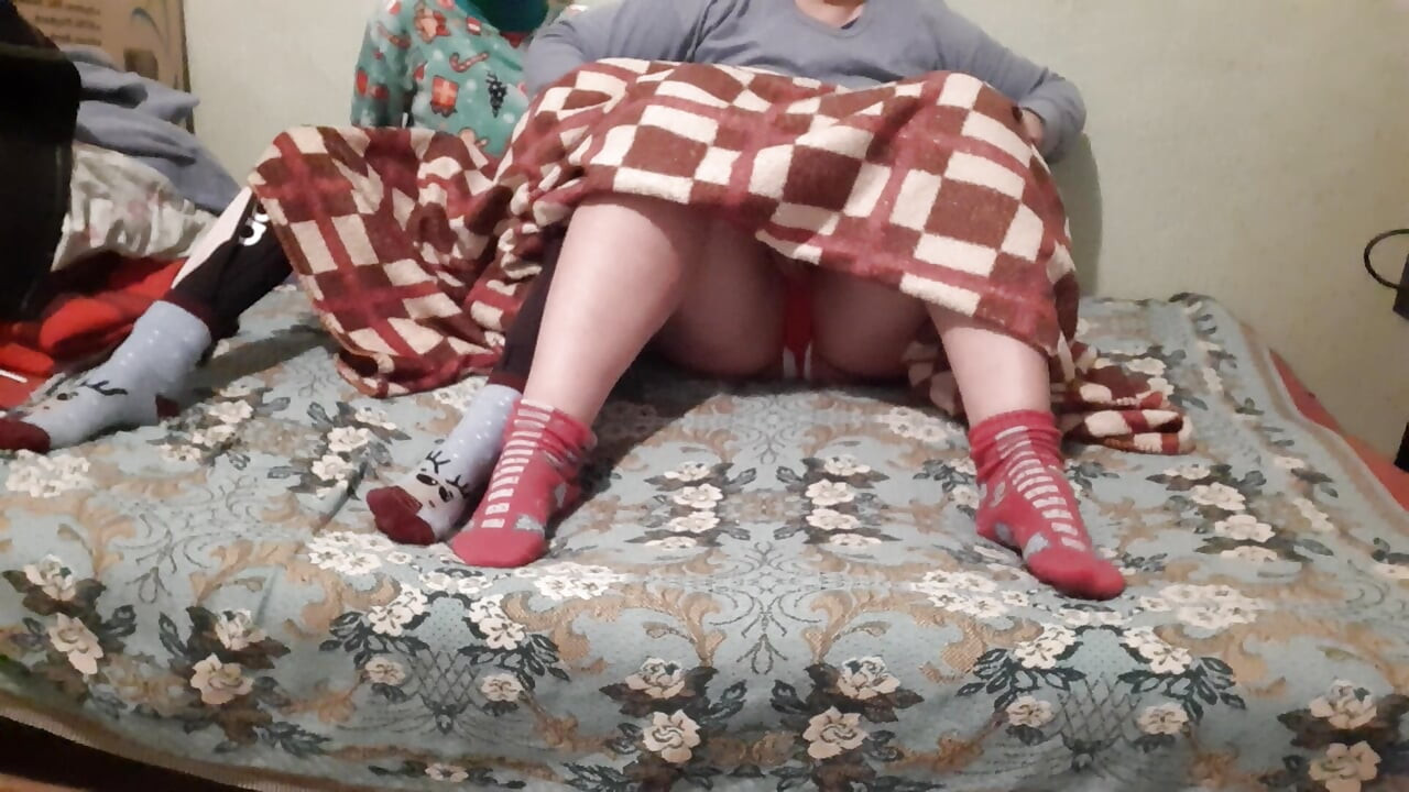 We mutual masturbate under the covers while our stepparents watch a movie next to us