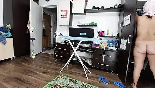 Sexy Brunette Doing Naked Chores Around the House.