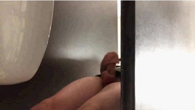 caught jerking under stall spy voyeur