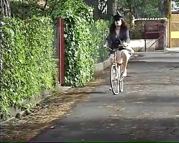 Jessica Rizzo in two scenes as a nymphomaniac postwoman