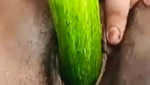 Teen college girl masterbating using cucumber
