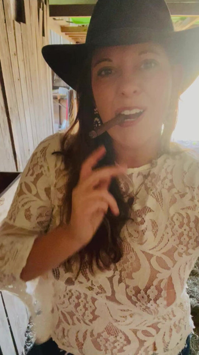 Cigar smoking country girl