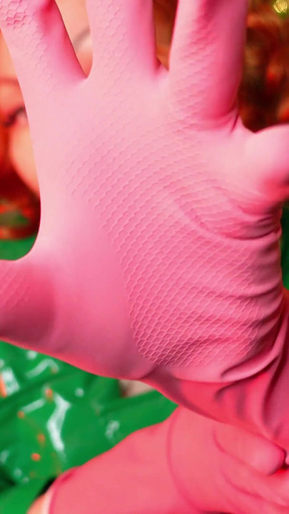 Pretty pin up model Arya and pink latex household gloves