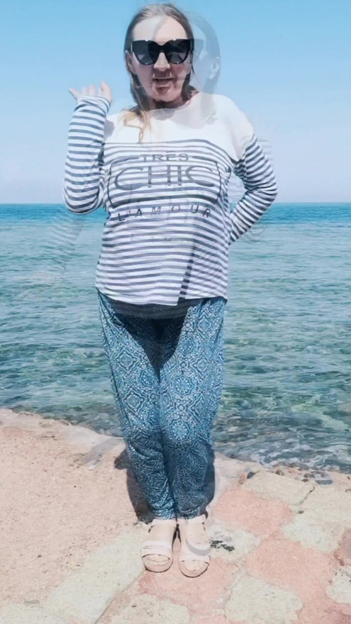 Hot Granny dance on the beach
