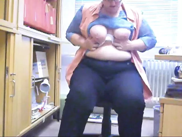 Office girl teases in her office