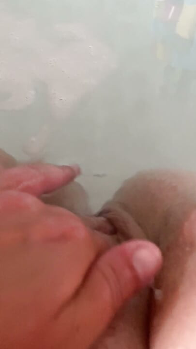 Massaging my pussy in the bath