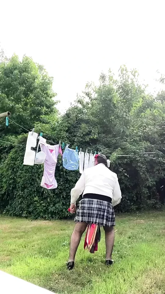 In an outfit with a new blouse on which I've modified the ascot tie to hang my laundry.