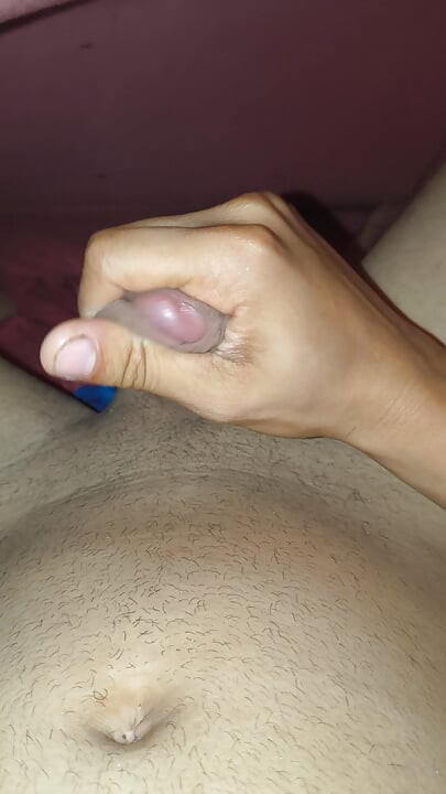 Under the blanket taking off underwear and playing with big thick cock