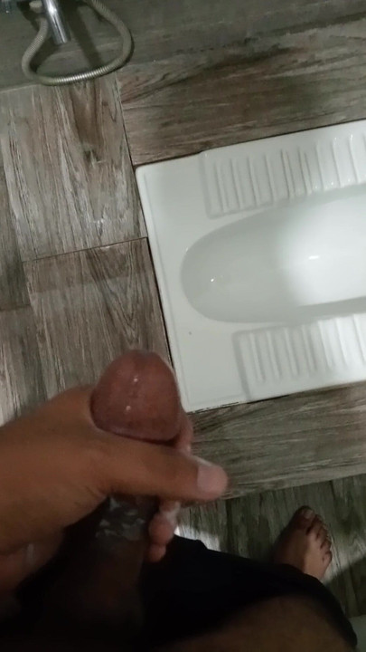 Masturbating