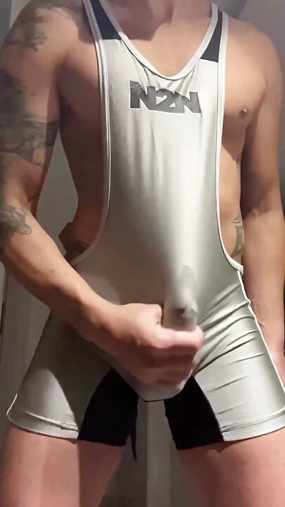 Muscle jock in lycra with huge cock thrusting until he cums