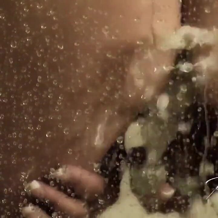 Rachel gets soaking wet in this shower tease