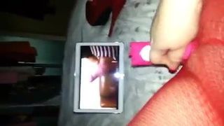 woman masturbates watching video