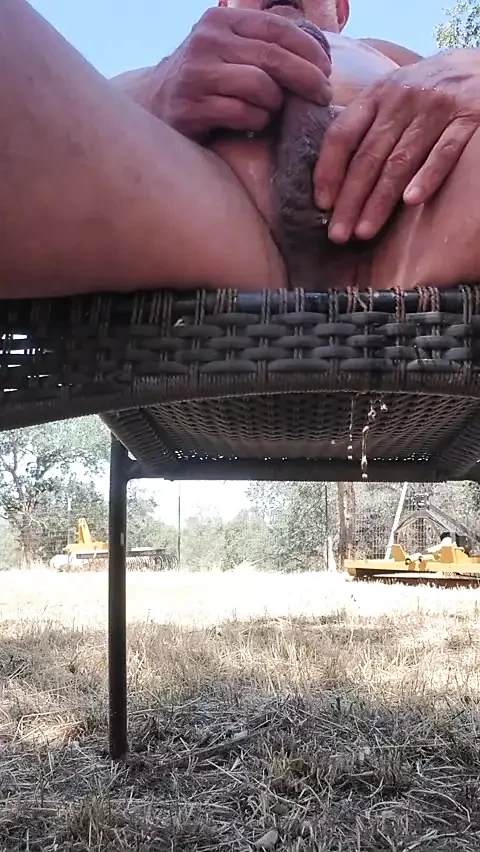 Grandpa pissing behind the barn