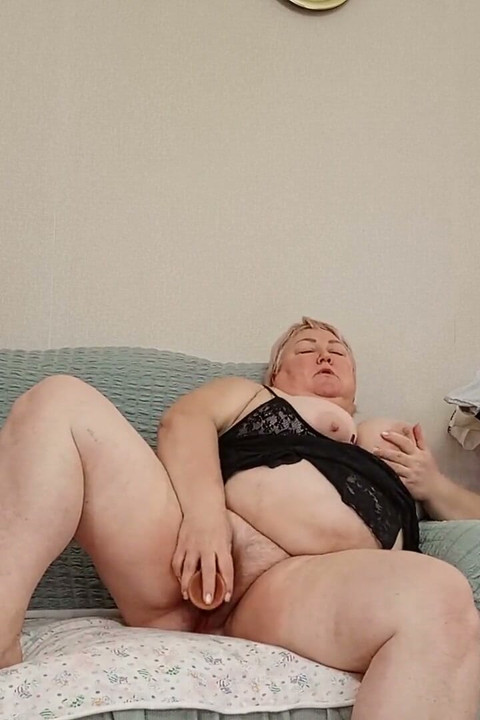 Mother-in-law with a Big Ass and a Dildo in Her Pussy