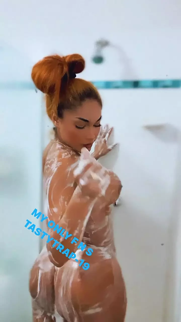 Young shemale in the shower