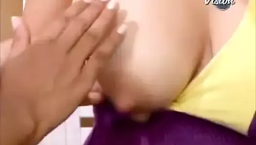 Older nurse helping busty Latina milk her nipples