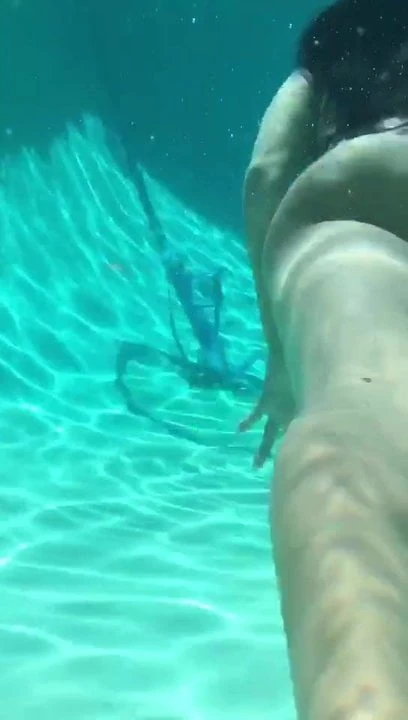 Brunette blowjob in poolside