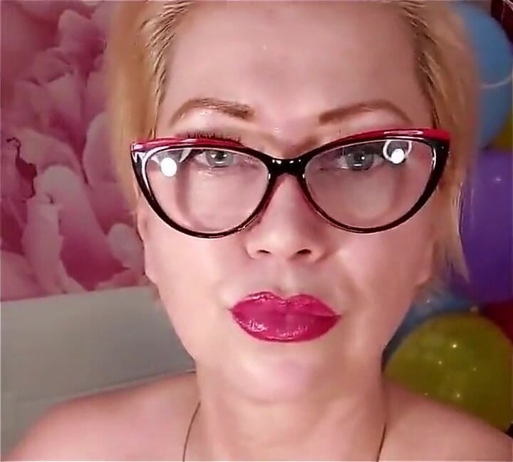 Dildoing of a Mature Bitch on a Background of Colorful Balloons