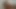 Beautiful Latina with a beautiful face touches her anus lying down