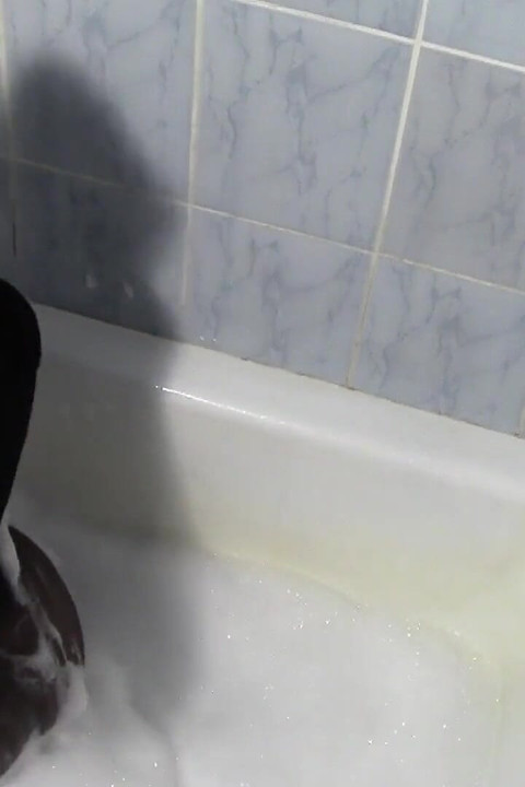 Sexy Louise, totally encased in pantyhose getting a bath
