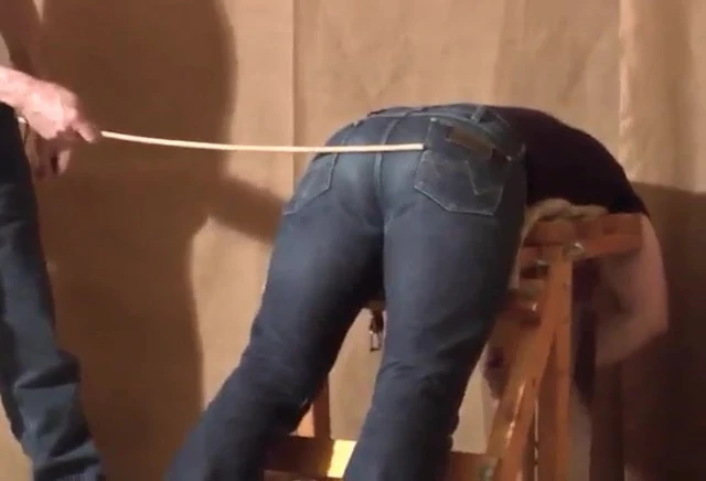Caned over tight jeans Daddy boy
