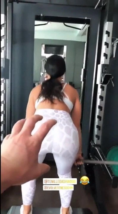 Tenille Dashwood lifting weight, showing off her perfect ass