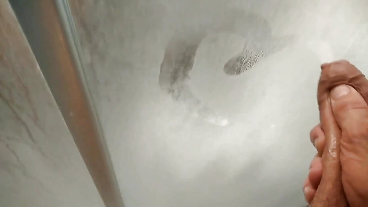 Nice Dark Skinny Boy with Nice Ass Plays and Moves His Big Cock in the Shower (part1)