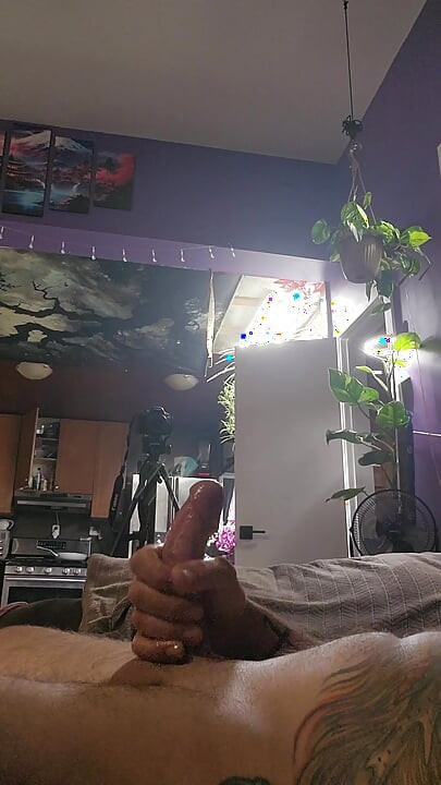 close up of big cock lubed up being stroked till it cum