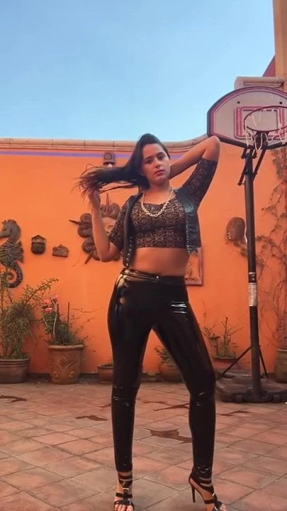 Spanish slut showing off her tight vinyl pants!!